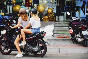 Two women on motorcycle