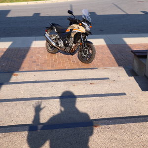 Motorcycle and man shadow
